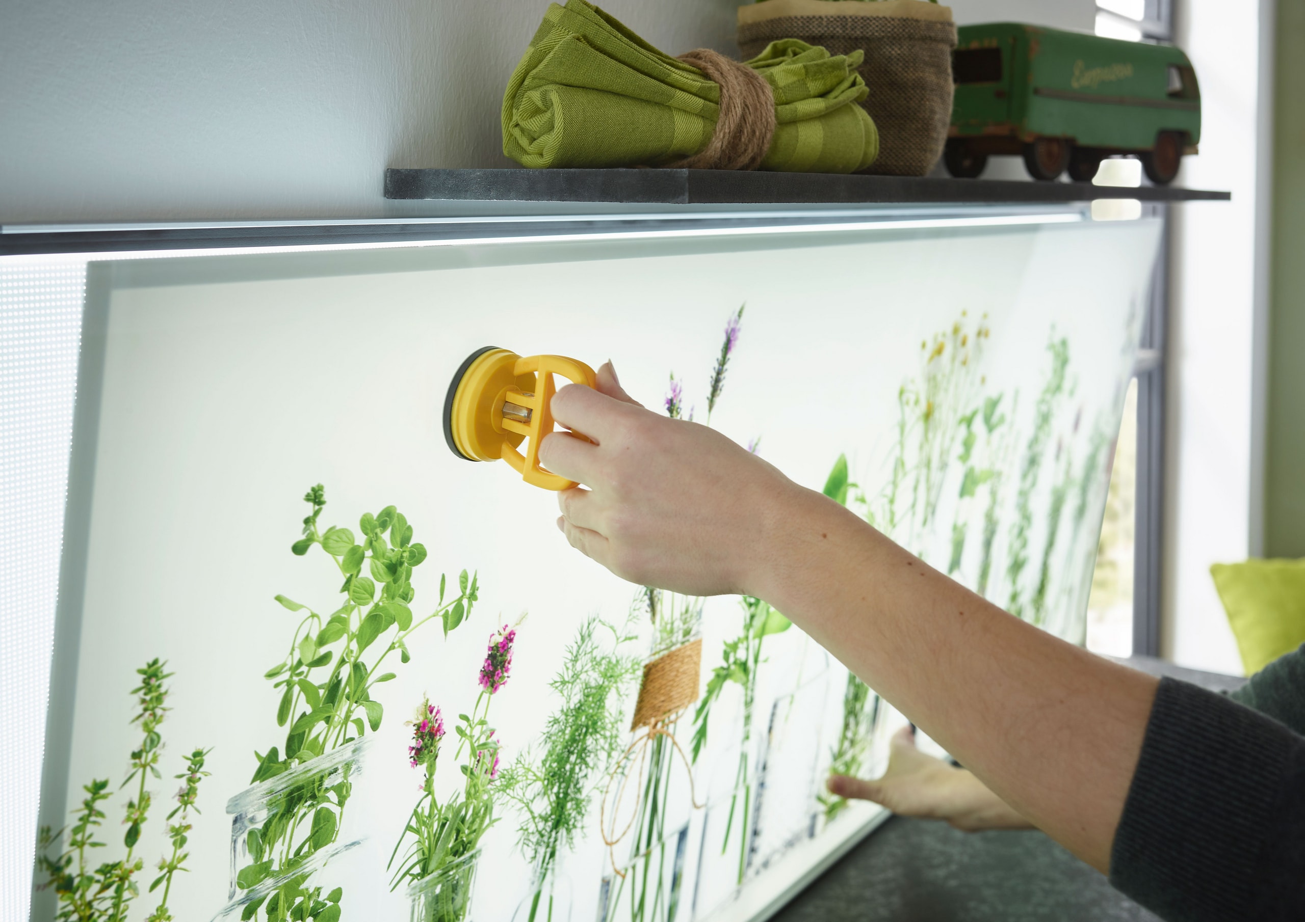 Switchy: LED-Wechselrahmen aus Glas